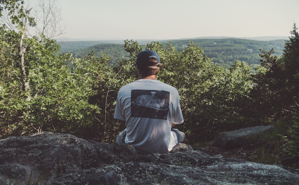 Person Wearing White Crew-neck Shirt